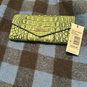 Green wallet.   Smoke free home.   Never used